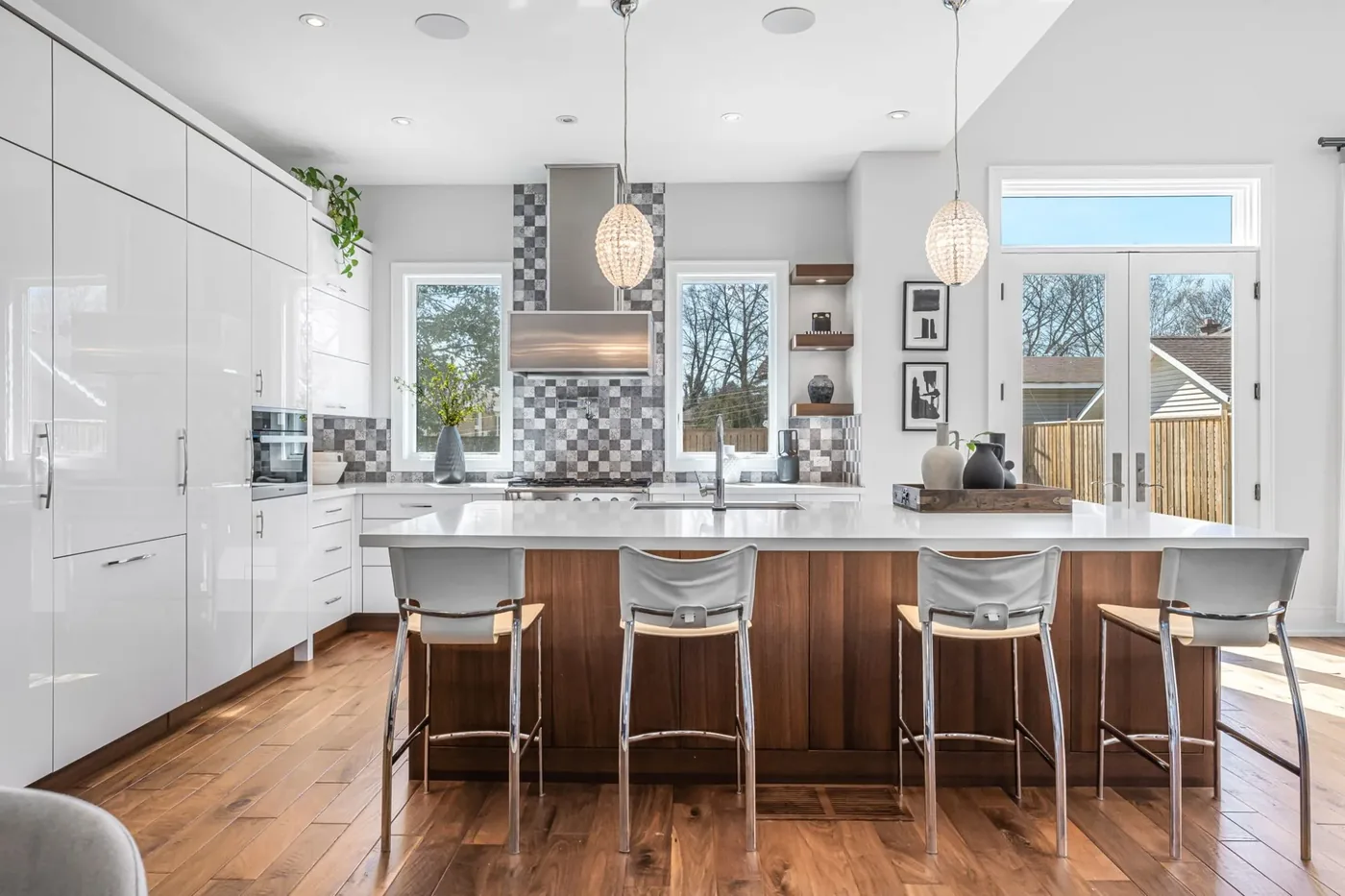 A modern kitchen with a walnut island